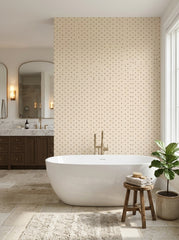 Brown polka dot wallpaper in a bathroom.