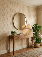 Brown polka dot wallpaper in an entryway.