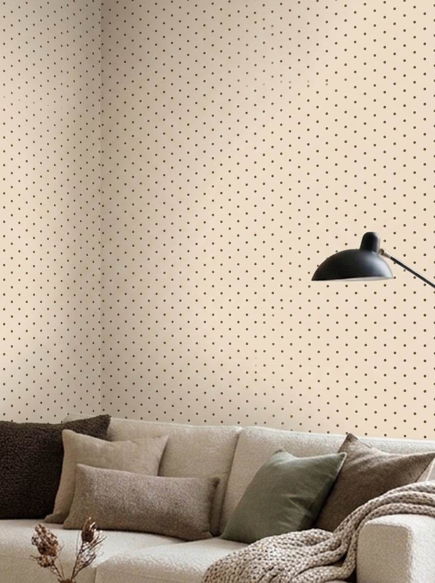 Brown polka dot wallpaper in a living room.