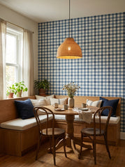 Navy gingham wallpaper in a breakfast nook.