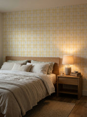 Yellow bluebell gingham wallpaper in a bedroom.