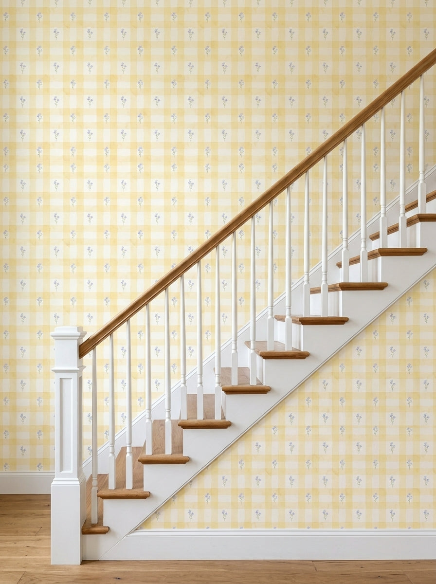 Yellow bluebell gingham wallpaper on a staircase wall.
