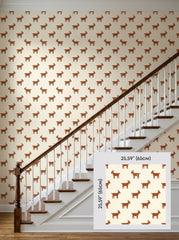 Rust goats wallpaper on a staircase wall, shown with a 65 cm (25.6 in) pattern sample.