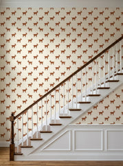 Rust goats wallpaper on a staircase wall.
