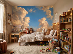 Golden painted cloud wallpaper in a kids room with bookshelves and toys.
