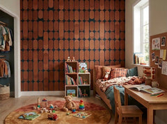 Terracotta retro capsule wallpaper in a kids room with toys and bookshelf.