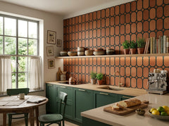 Terracotta oval trellis wallpaper in a kitchen with green cabinets.