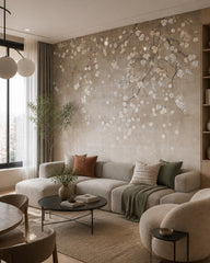 Blossoming branches on beige wallpaper in a designer living room.
