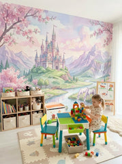 Pink fairytale castle wallpaper in a playroom with a building-block table.
