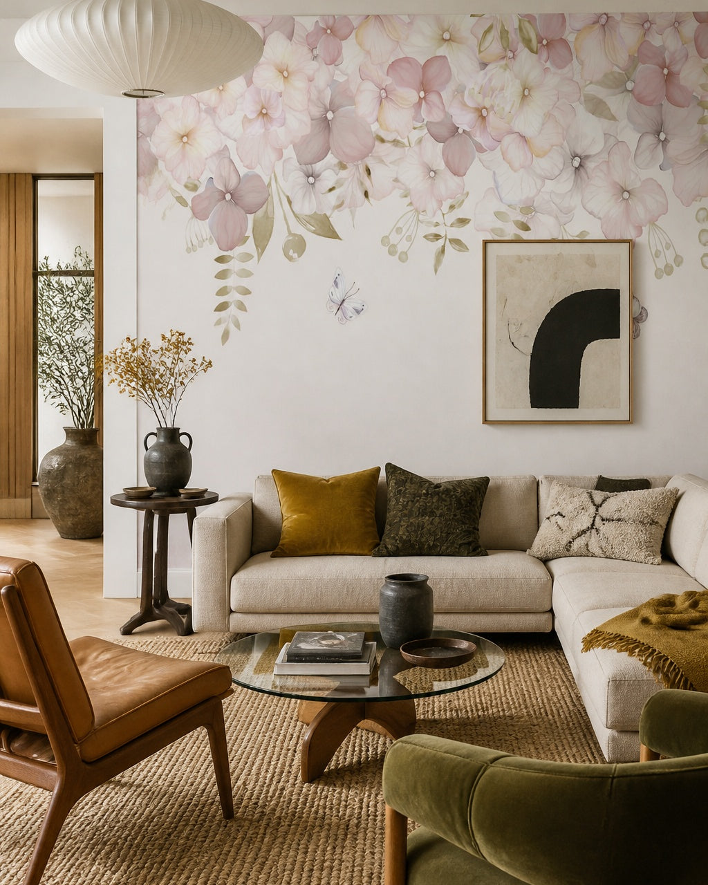 Blush flowers and butterflies wallpaper in a designer living room.