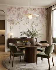 Blush flowers and butterflies wallpaper in a refined dining area.