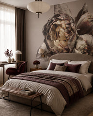 Dramatic peony close-up wallpaper in a designer bedroom.