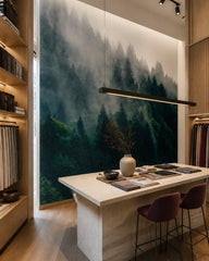 Foggy evergreen forest wallpaper in a design showroom.