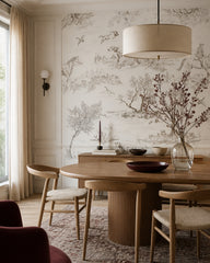 Countryside toile wallpaper in a refined dining area.