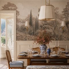 Vintage garden wallpaper with layered trees and neutral botanical scenery in a sophisticated olive green home office.