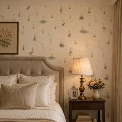 Neutral goose wallpaper shown in an elegant bedroom with upholstered headboard, brass lamp and classic decor.