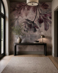 Plum hanging flowers wallpaper in an entryway with a console.