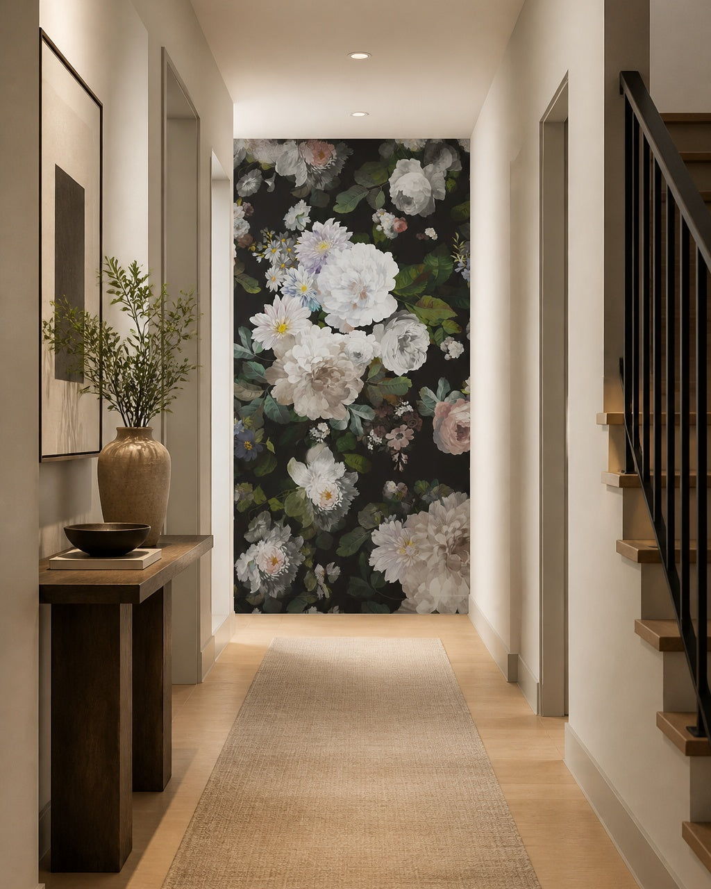 White peonies on black wallpaper in an entryway with a console.