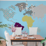 Patterned World Map Art with Geometric Designs and Bold Colors on Blue Background