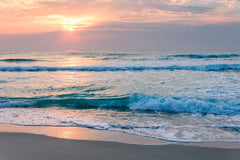 Custom Tranquil Sunrise Over Ocean Waves Wall Mural Wallpaper